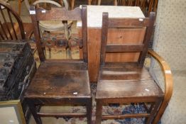 Two 19th Century oak hard seated country dining chairs