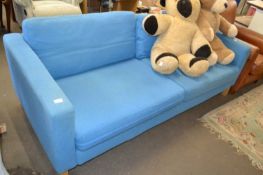 Blue upholstered three seater sofa