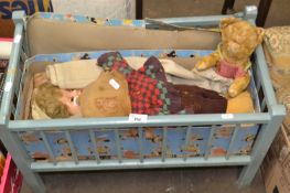 Blue painted children's toy cot and soft toys