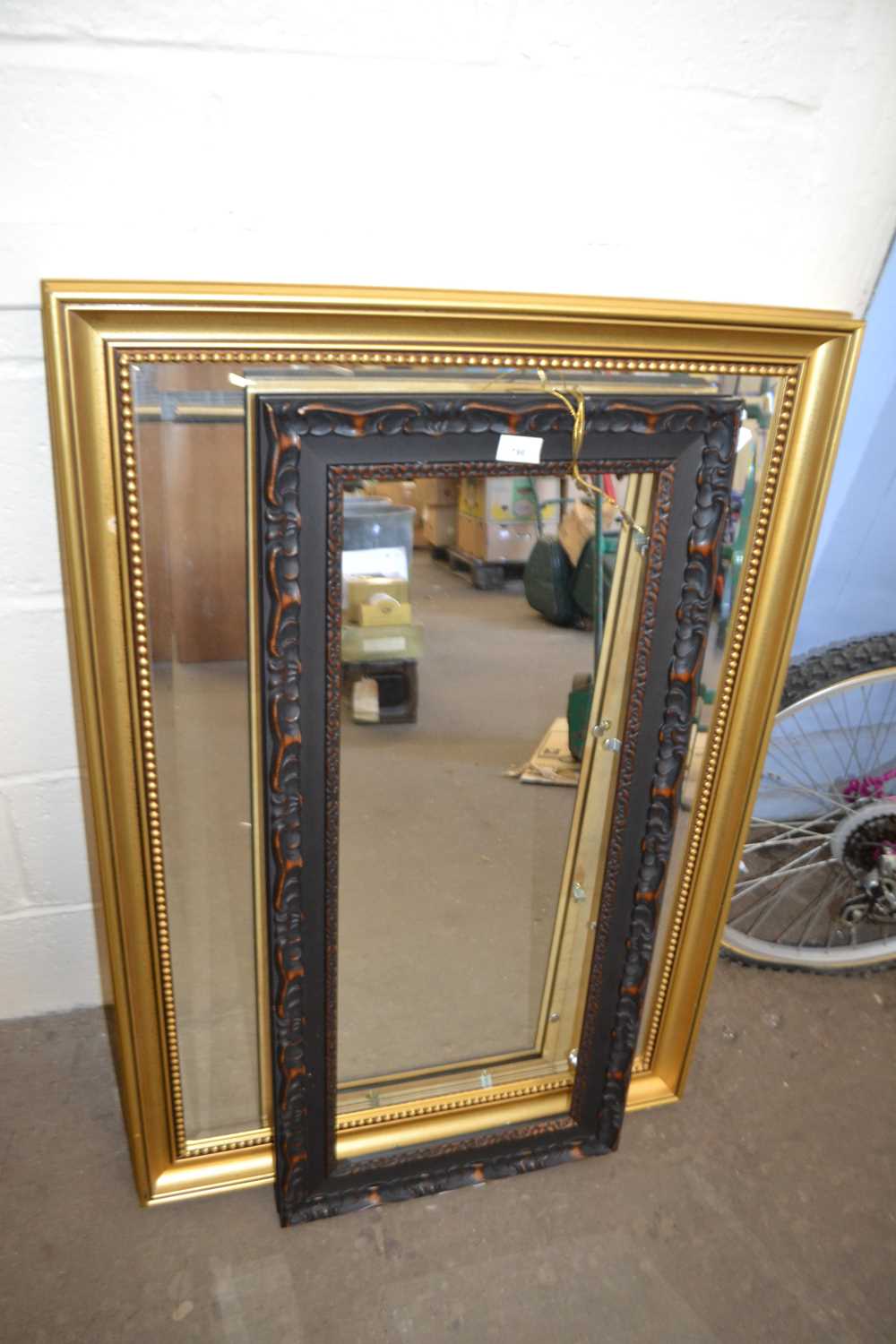 Gilt framed wall mirror together with a moulded picture frame