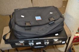 Black combination briefcase and a laptop bag
