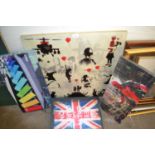 Five contemporary canvas prints including one by Banksy