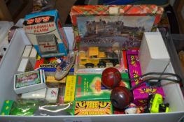 Box of assorted toy cars and children's games