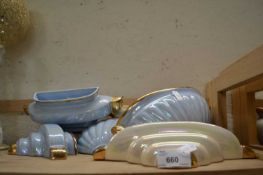 Quantity of pastel and gilt glazed wall pockets