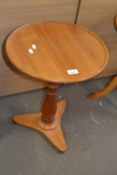 Round pine side table