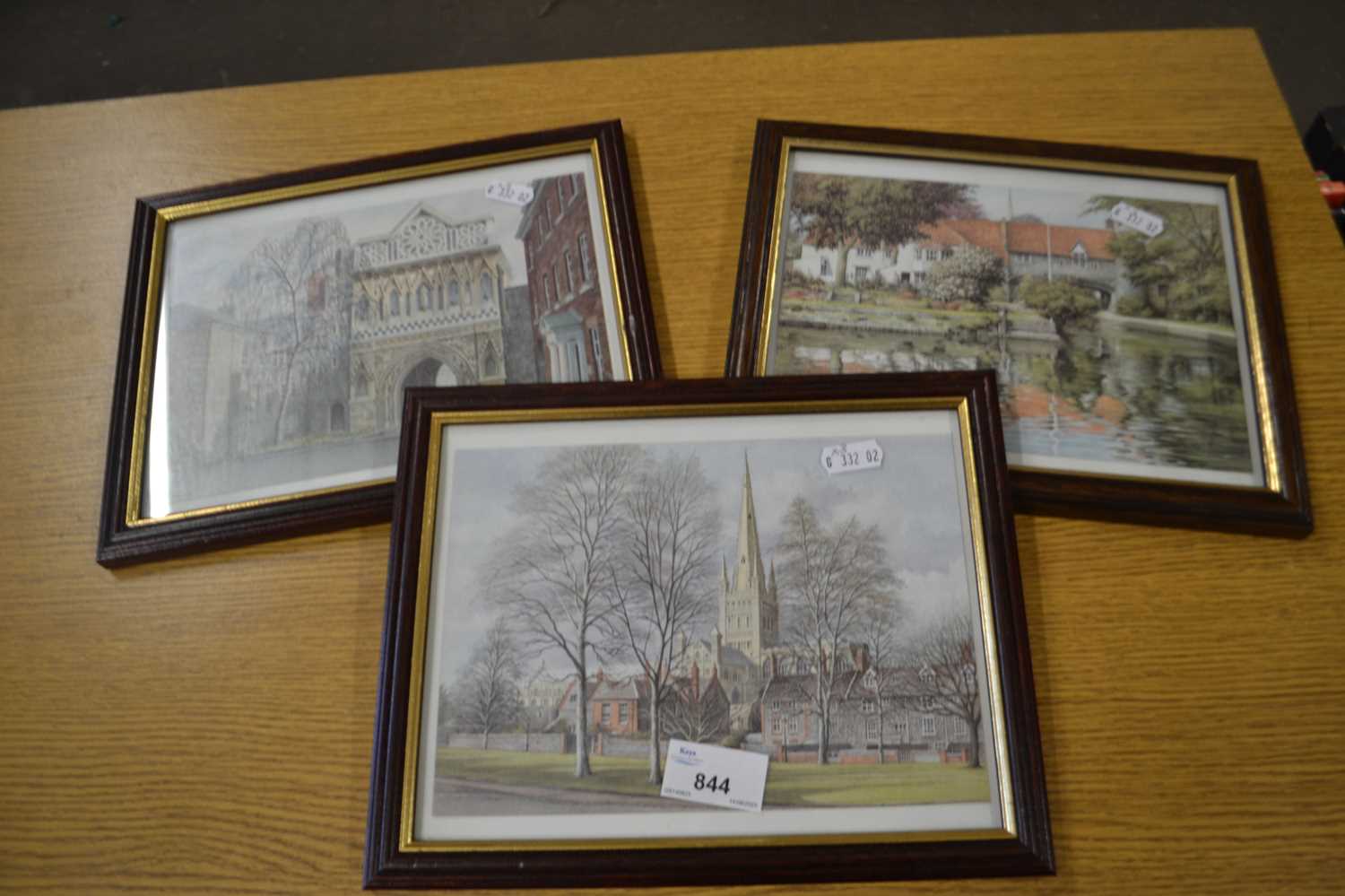 Three landscape prints, framed