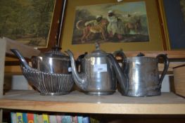 Three metal ware teapots