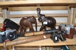 Mixed Lot: Carved wooden elephants, truncheon, whip, viewmaster, cameras etc