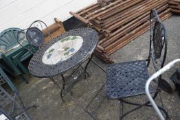 Metal garden table and two chairs