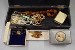 Small lacquered box containing various assorted costume jewellery