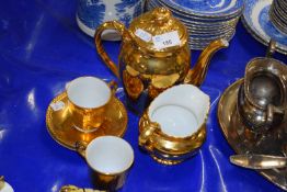 Royal Worcester gilt decorated tea for two set