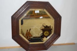 An early 20th Century octagonal bevelled wall mirror