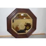 An early 20th Century octagonal bevelled wall mirror