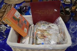 Basket containing various British first day covers, presentation packs plus a further quantity of on