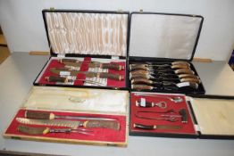 Four cases of various steak knives, carving sets, bar tools etc