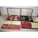 Four cases of various steak knives, carving sets, bar tools etc