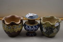 Group of three small Doulton stone ware vases