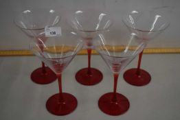 A set of vintage red stemmed Martini glasses