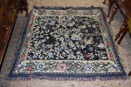 Modern needlepoint rug decorated with a central design of a tree, 135cm wide