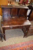 Late 19th Century stained pine writing table with shelf to back, 83cm wide