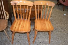 Two pine kitchen chairs
