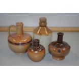 Collection of four Doulton miniature jugs and bottles