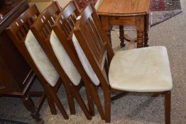 Set of four folding dining chairs