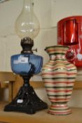 Iron based oil lamp and an Italian pottery vase