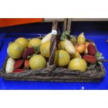 Basket of fake fruit and vegetables
