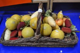 Basket of fake fruit and vegetables