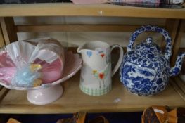 Modern blue and white kettle, flower shaped cake stand, ice cream mould and a Marks & Spencers jug