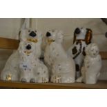 Collection of three pairs of Staffordshire dogs