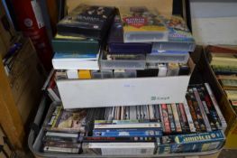Large quantity of assorted DVD's, VHS, cassettes and others