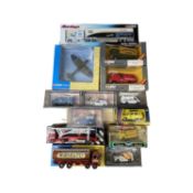 A mixed lot of various boxed Corgi die-cast vehicles.