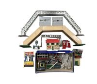A collection of tin plate, die-cast and plastic railway scenery, to include: - A Marklin