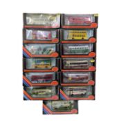 A collection of various large boxed Exclusive First Editions die-cast buses, to include Western