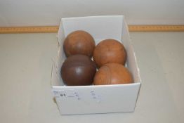 Four vintage wooden balls