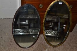 Early 20th Century brass framed oval bevelled wall mirror and one other (2)