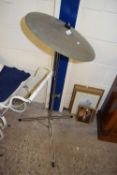 Cymbal mounted on tripod base