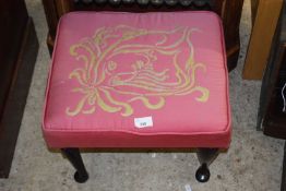 Pink upholstered footstool