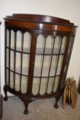 Early 20th Century mahogany bow front single door china display cabinet on ball and claw feet, 106cm