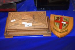 Oak fabric lined jewellery box together with a small heraldic plaque