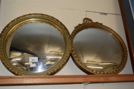Two convex wall mirrors in gilt finish frames