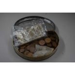Tin or pre-decimal British pennies and a small quantity of other coins and bank notes
