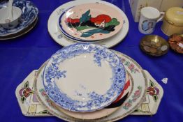 Collection of various decorated plates to include an oval meat plate, hand painted plates in the