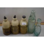 Collection of vintage ginger beer and other bottles
