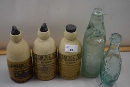 Collection of vintage ginger beer and other bottles