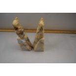 Pair of marble book ends formed as parrots