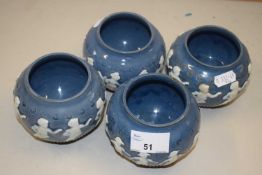 Group of three small Doulton stone ware vases