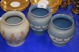 Three small Doulton silicon ware vases